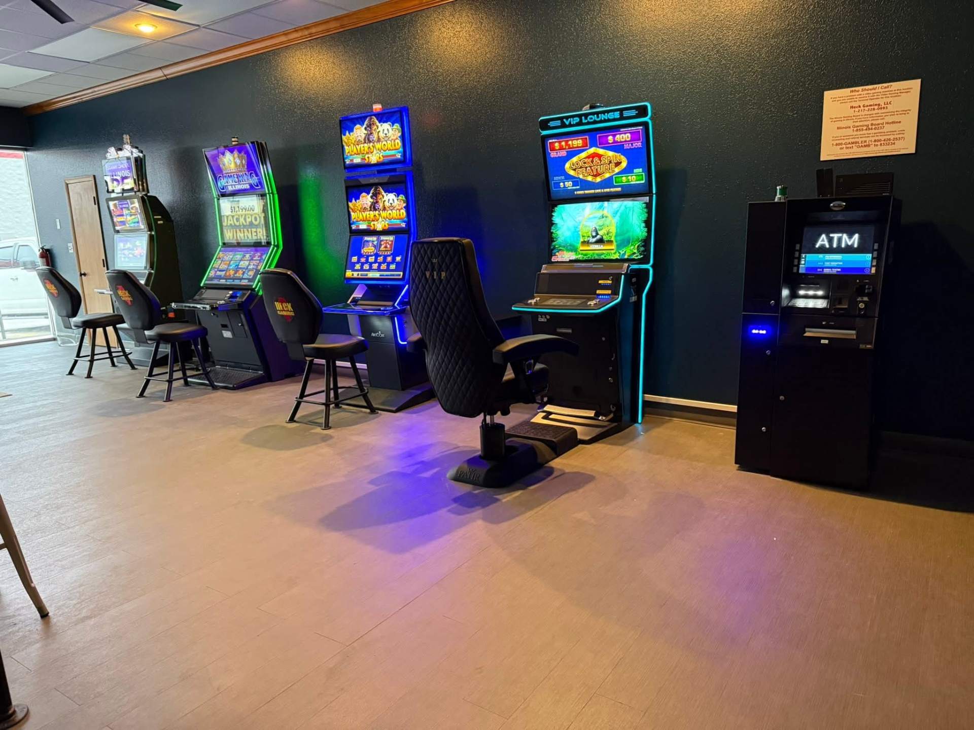 Spacious gaming floor with Player's World Stars and Lock & Spin cabinets plus on-site ATM